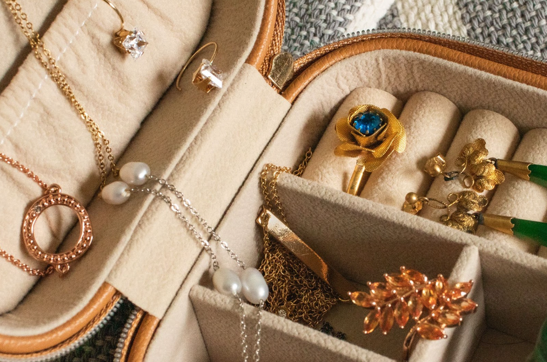 A Jewelry Box with Vintage Rings, Earrings, and Necklaces