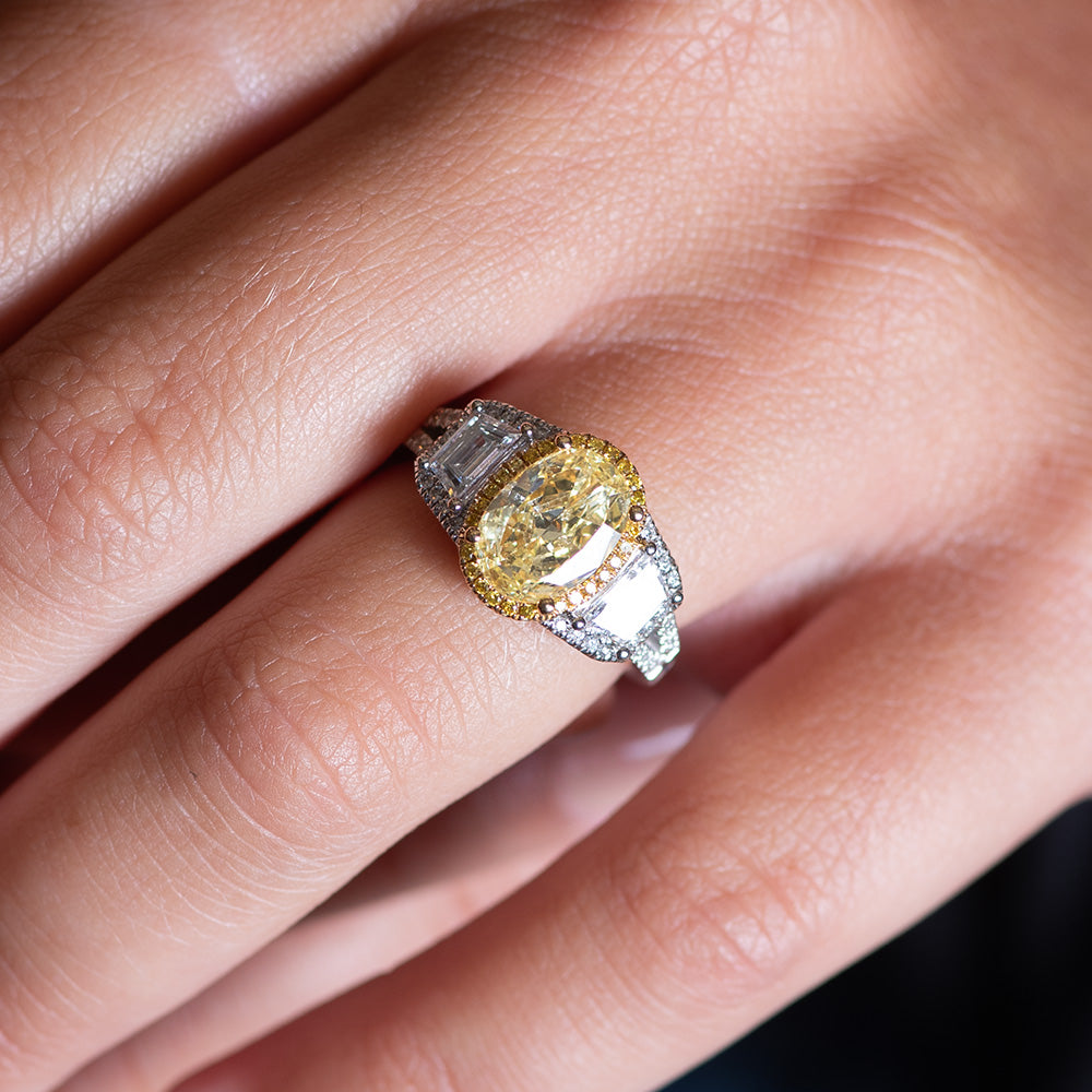 Yellow oval engagement ring