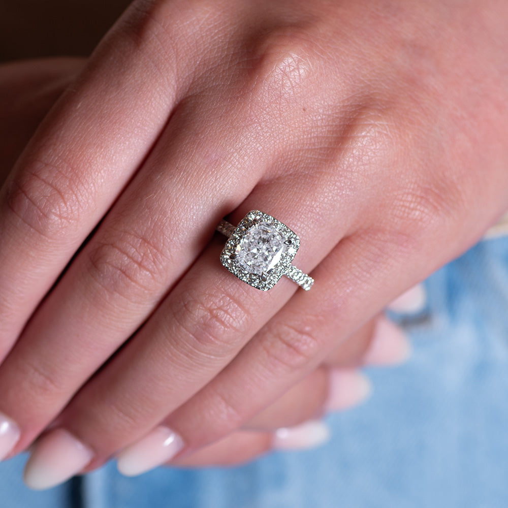 Halo radiant cut engagement ring