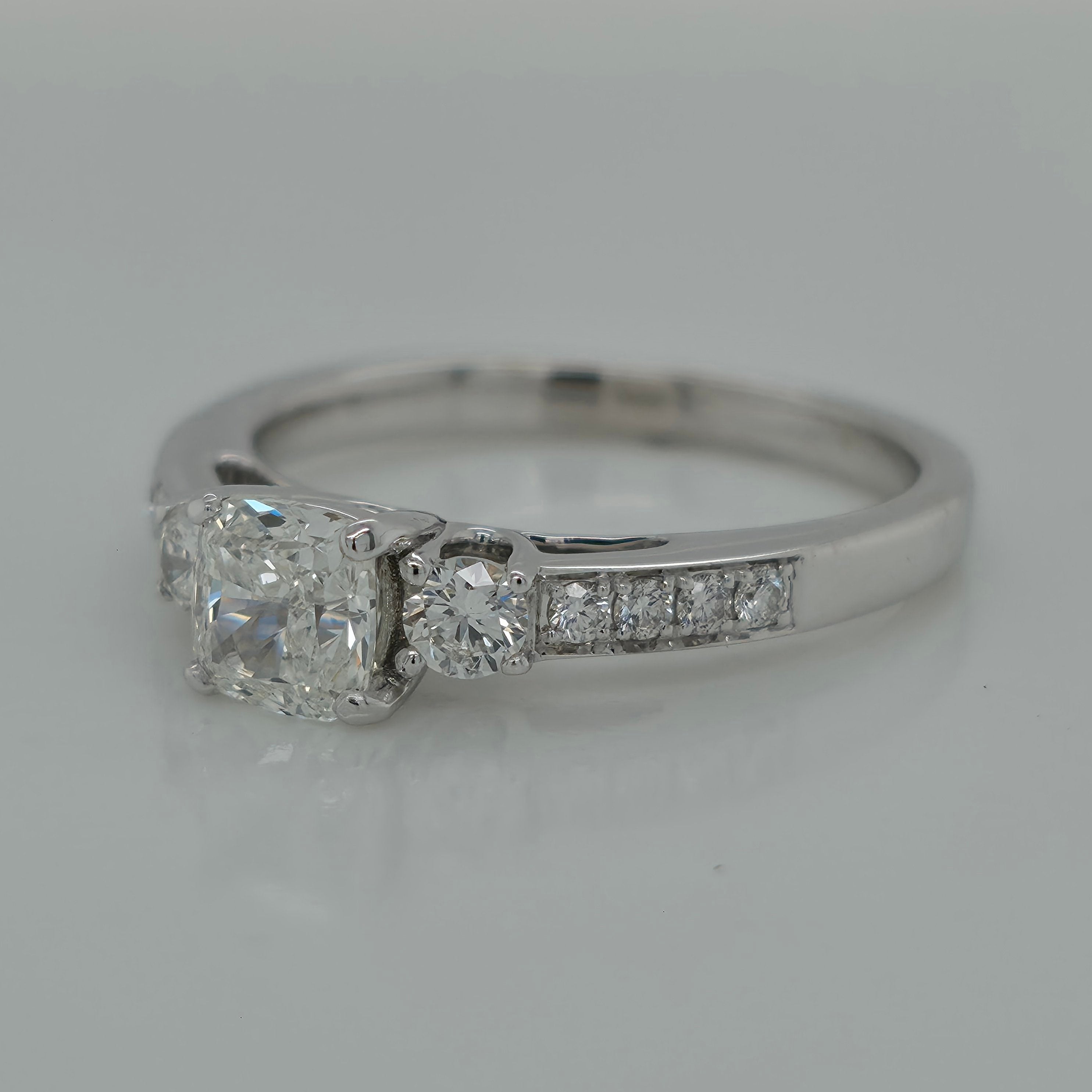 0.85ct Cushion Shaped Three Stone Diamond Engagement Ring