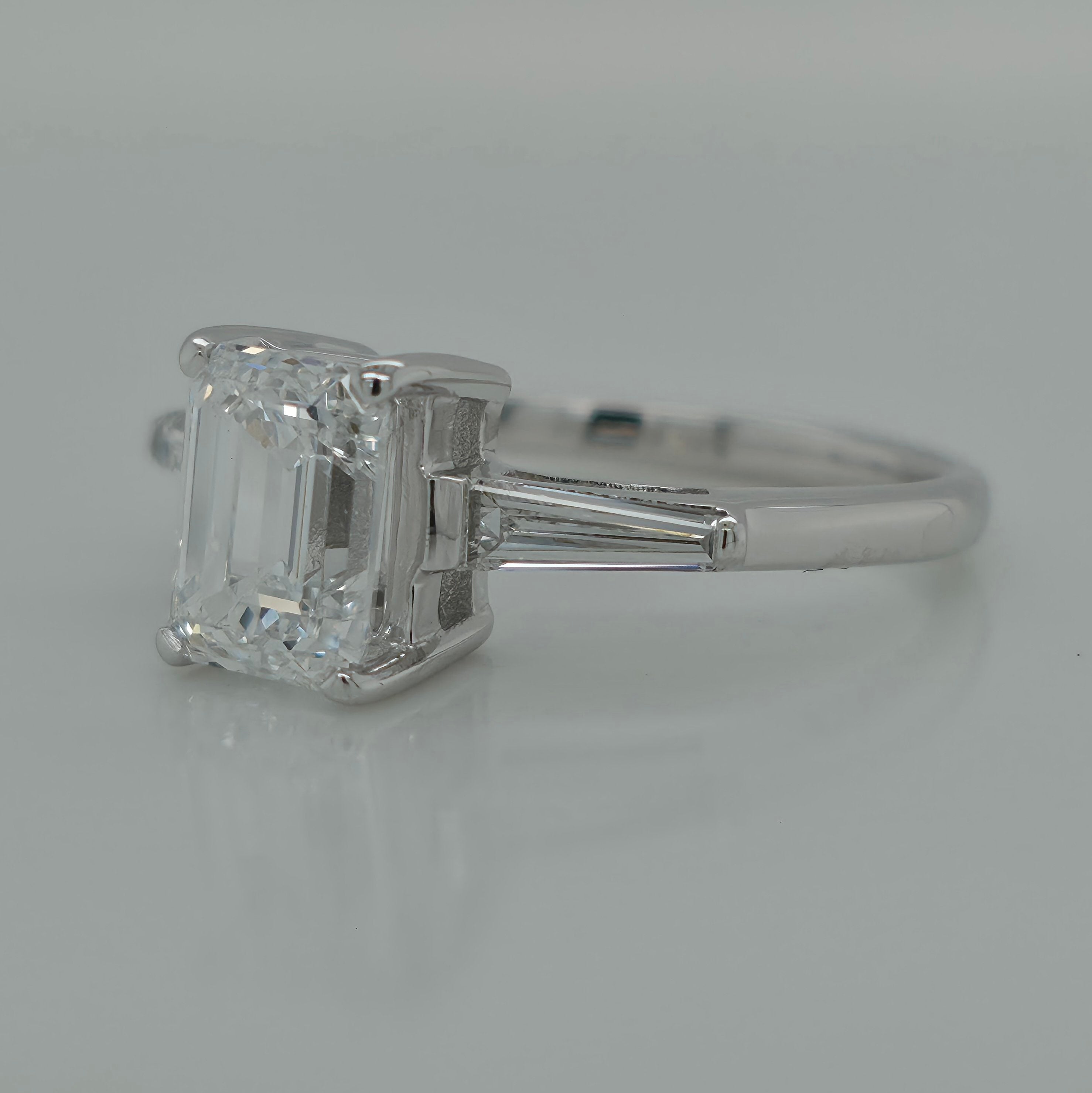 1.51ct Emerald Cut Three Stone Diamond Engagement Ring