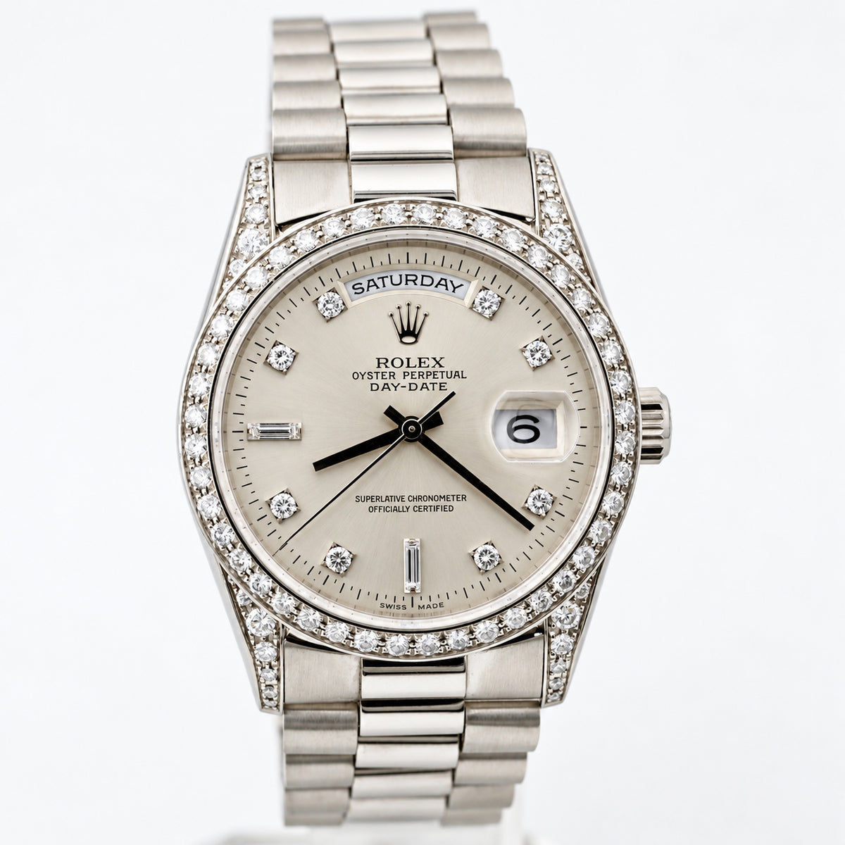 Pre Owned Rolex Day-Date Platinum, factory diamond bezel & diamond lugs, silver dial w/ diamond markers ref. 18296
