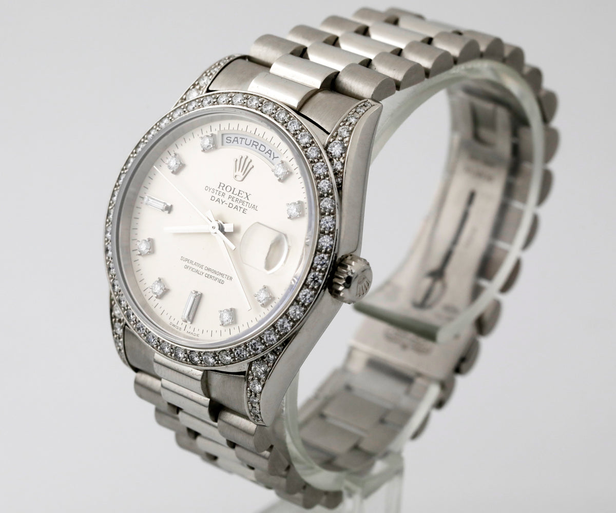 Pre Owned Rolex Day-Date Platinum, factory diamond bezel & diamond lugs, silver dial w/ diamond markers ref. 18296