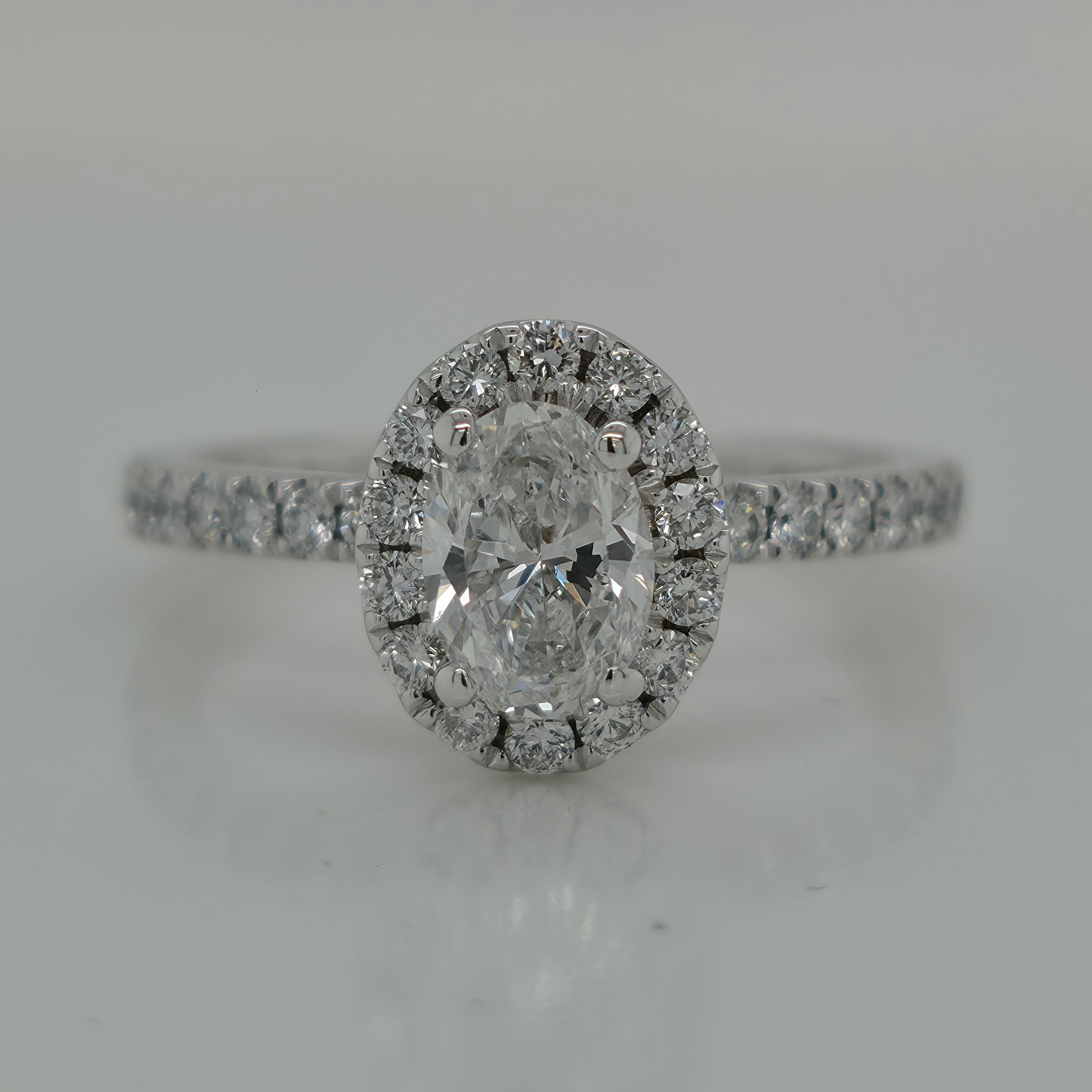0.72ct Oval Diamond Halo Engagement Ring