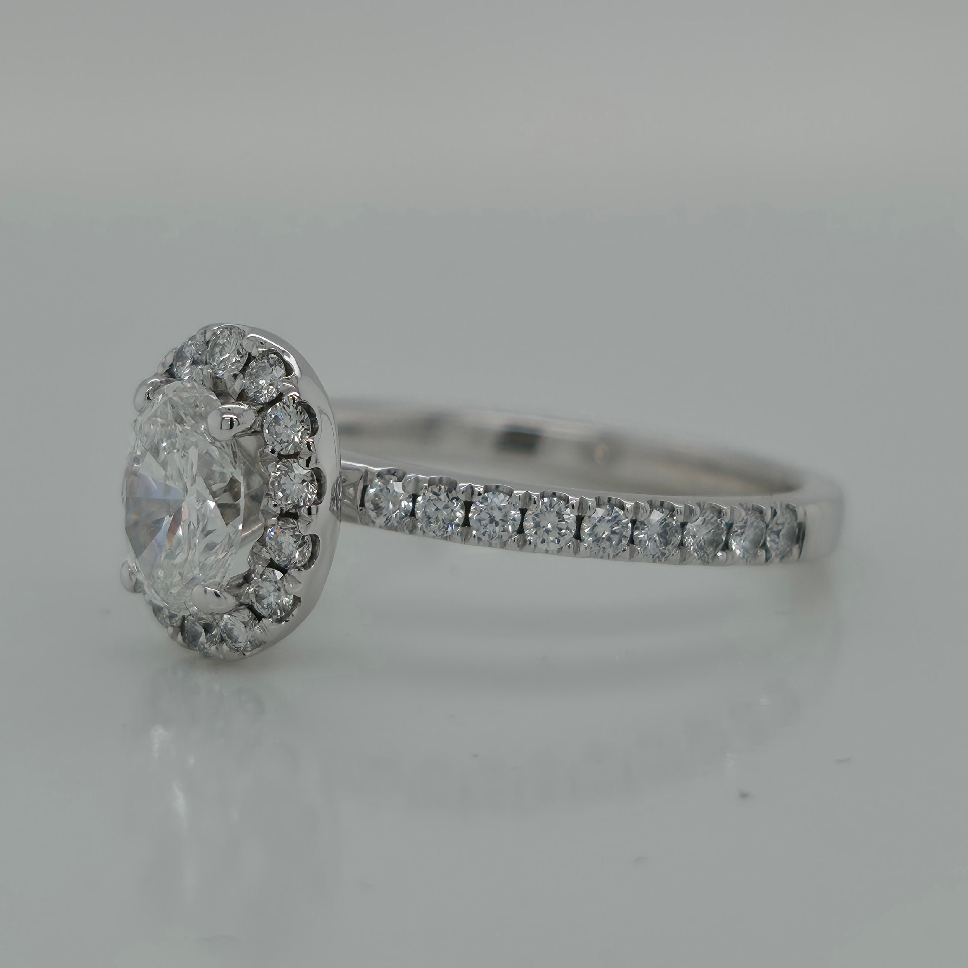 0.72ct Oval Diamond Halo Engagement Ring